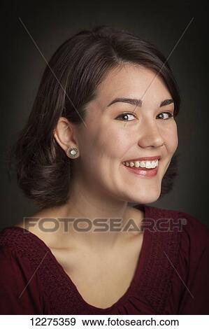 Portrait of a young woman; United States of America View Large Photo Image Stock Photo - Portrait of a young woman; United States of America. Fotosearch