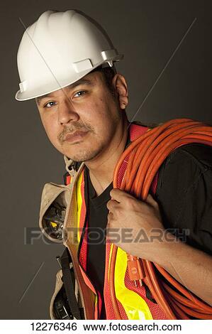 Portrait of an electrician; Edmonton, Alberta, Canada View Large Photo Image Stock Photograph - Portrait of an electrician; Edmonton, Alberta, Canada. Fotosearch