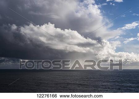 Rain falls off the coast; Manzanita, Oregon, United States of America View Large Photo Image Stock Photograph - Rain falls off the coast; Manzanita, Oregon, United States of America. Fotosearch