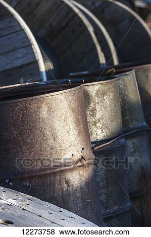 Row of rusted and weathered 55 gallon drums; Noatak, Alaska, United States of America View Large Photo Image Stock Photo - Row of rusted and weathered 55 gallon drums; Noatak, Alaska, United States of America. Fotosearch