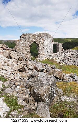 Stock Image - Ruins of a stone building; Arkengarthdale, North Yorkshire, England. Fotosearch