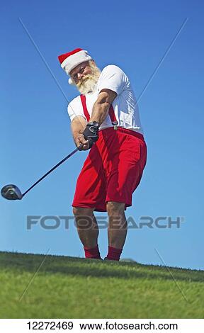 Stock Photo - Santa Claus on the golf course; Maui, Hawaii, United States of America. Fotosearch