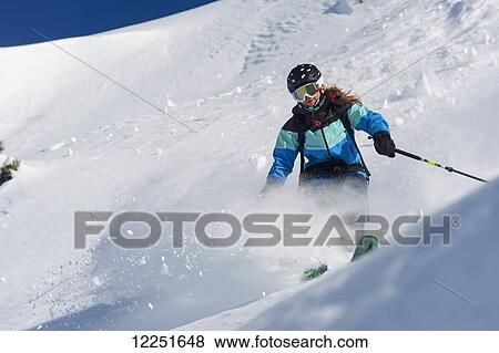 Skiing in powder snow; St. Moritz, Graubunden, Switzerland View Large Photo Image Stock Photo - Skiing in powder snow; St. Moritz, Graubunden, Switzerland. Fotosearch