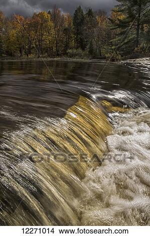 Small waterfall at the top of Rosseau Falls in the Rosseau River, near the town of Rosseau; Ontario, Canada View Large Photo Image Picture - Small waterfall at the top of Rosseau Falls in the Rosseau River, near the town of Rosseau; Ontario, Canada. Fotosearch