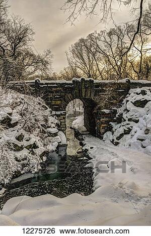 Snow-covered Glen Span Arch, Central Park; New York City, New York, United States of America View Large Photo Image Stock Photograph - Snow-covered Glen Span Arch, Central Park; New York City, New York, United States of America. Fotosearch