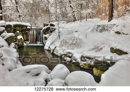 Snow-covered waterfall in The Loch, Central Park; New York City, New York, United States of America View Large Photo Image Stock Photo - Snow-covered waterfall in The Loch, Central Park; New York City, New York, United States of America. Fotosearch