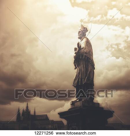 Stock Photograph - Statue on Karl Bridge; Prague, Czech Republic. Fotosearch