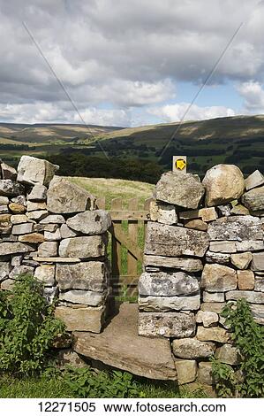 Stile and gate in a drystone wall on a public footpath near Burtersett; Hawes, North Yorkshire, England View Large Photo Image Stock Photography - Stile and gate in a drystone wall on a public footpath near Burtersett; Hawes, North Yorkshire, England. Fotosearch