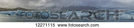 Stock Photography - Stitched panoramic image of the Jokulsarlon glacial lagoon along the Southern coast of Iceland; Iceland. Fotosearch