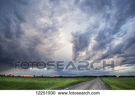 Storm clouds at sunset, near Winnipeg; Manitoba, Canada View Large Photo Image Stock Image - Storm clouds at sunset, near Winnipeg; Manitoba, Canada. Fotosearch
