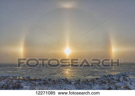 Sundog over top of Hudson Bay; Manitoba, Canada View Large Photo Image Stock Photography - Sundog over top of Hudson Bay; Manitoba, Canada. Fotosearch