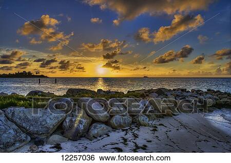 Sunset over Dickenson Bay; St. John's, Antigua, West Indies View Large Photo Image Stock Photograph - Sunset over Dickenson Bay; St. John's, Antigua, West Indies. Fotosearch
