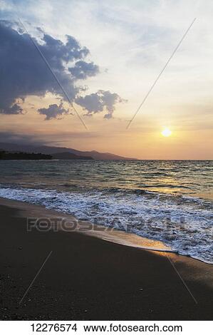 Picture - Sunset over the Wetar Strait; Dili, East Timor. Fotosearch
