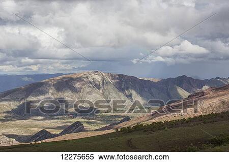 The colourful mountainous landscape of Toro Toro National Park with the town of Toro Toro seen in the distance; Bolivia View Large Photo Image Stock Photography - The colourful mountainous landscape of Toro Toro National Park with the town of Toro Toro seen in the distance; Bolivia. Fotosearch