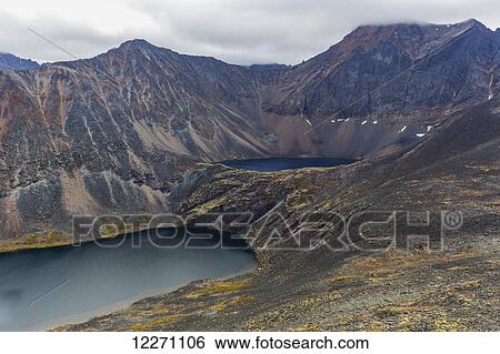 Stock Photograph - The Syenite Lakes deep within Tombstone Territorial Park; Yukon, Canada. Fotosearch