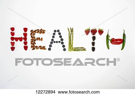 Picture - The word Organic spelled from peppers, strawberries, blackberries, almonds, blueberries, raspberries, asparagus, and pumpkin seeds on a white background; Calgary, Alberta, Canada. Fotosearch