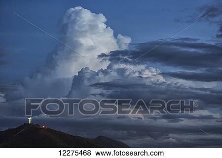 pictures of thunderheads or cumulo nimbus clouds build up over the