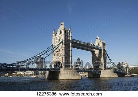 Stock Photograph - Tower Bridge crosing the River Thames; London, England. Fotosearch