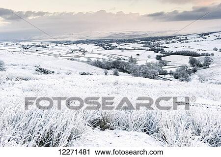 Stock Image - Upper Eden valley covered in snow, near Kirkby Stephen; Cumbria, England. Fotosearch