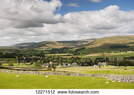 Stock Image - Upper Wensleydale looking over Hawes from Burtersett; North Yorkshire, England. Fotosearch