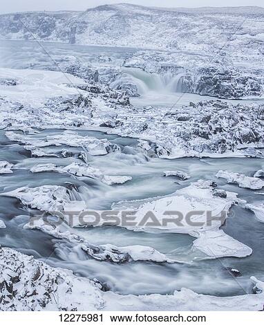 Stock Image - Urrioafoss, a waterfall in southern Iceland lies just off the Ring Road; Iceland. Fotosearch