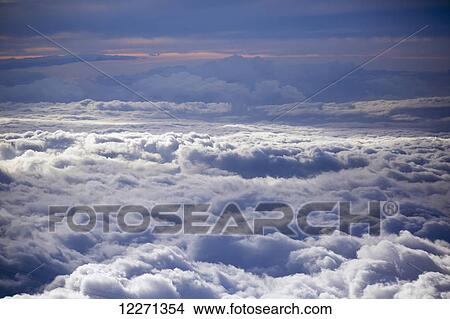 View above the clouds from the top of Haleakala National Park; Maui, Hawaii, United States of America View Large Photo Image Picture - View above the clouds from the top of Haleakala National Park; Maui, Hawaii, United States of America. Fotosearch