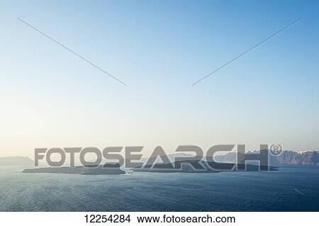 Picture - View of the islands and coastlines; Santorini, Greece. Fotosearch