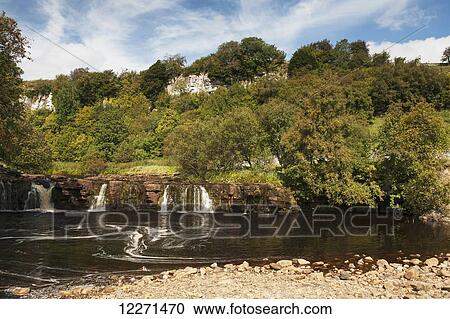 Wainwath Falls on the River Swale near Keld, in the Yorkshire Dales National Park, in late summer; Yorkshire, England View Large Photo Image Stock Image - Wainwath Falls on the River Swale near Keld, in the Yorkshire Dales National Park, in late summer; Yorkshire, England. Fotosearch
