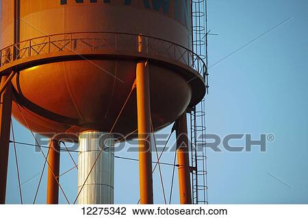 Water tower against a blue sky; Nipawin, Saskatchewan, Canada View Large Photo Image Stock Image - Water tower against a blue sky; Nipawin, Saskatchewan, Canada. Fotosearch