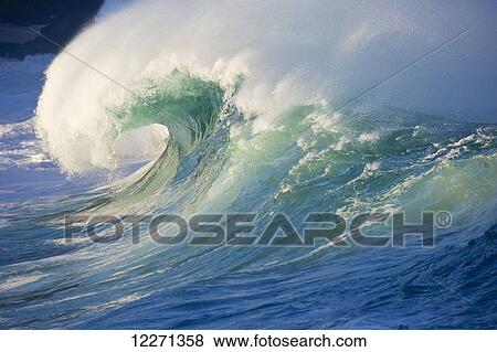 Stock Photo - Waves breaking at Waimea Bay on the North shore of Oahu; Oahu, Hawaii, United States of America. Fotosearch