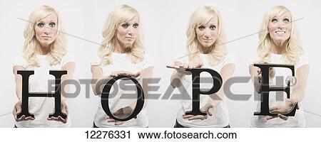 Woman holding letters spelling hope; Edmonton, Alberta, Canada View Large Photo Image Stock Image - Woman holding letters spelling hope; Edmonton, Alberta, Canada. Fotosearch