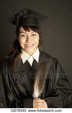Young woman in graduation cap and gown; Edmonton, Alberta, Canada View Large Photo Image Stock Photography - Young woman in graduation cap and gown; Edmonton, Alberta, Canada. Fotosearch