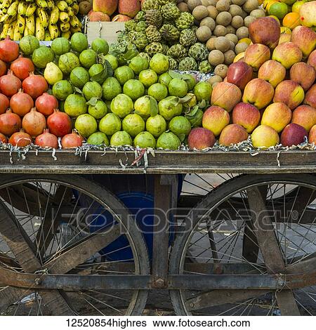 A cart full of fresh fruit for sale; Jaipur, Rajasthan, India View Large Photo Image Stock Photograph - A cart full of fresh fruit for sale; Jaipur, Rajasthan, India. Fotosearch