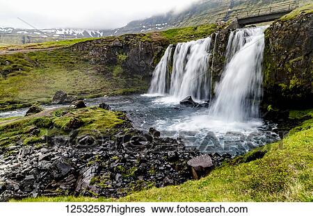 A close-up of Kirkjufellsfoss by the Kirkjufell mountain in Western Iceland; Grundarfjorour, Iceland View Large Photo Image Stock Photograph - A close-up of Kirkjufellsfoss by the Kirkjufell mountain in Western Iceland; Grundarfjorour, Iceland. Fotosearch