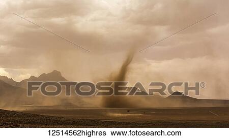 Stock Photograph - A dust devil in the desert; Sossusvlei, Hardap Region, Namibia. Fotosearch
