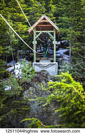 A hand tram over Winner Creek near Girdwood, Kenai National Forest, South-central Alaska; Girdwood, Alaska, United States of America View Large Photo Image Stock Photograph - A hand tram over Winner Creek near Girdwood, Kenai National Forest, South-central Alaska; Girdwood, Alaska, United States of America. Fotosearch