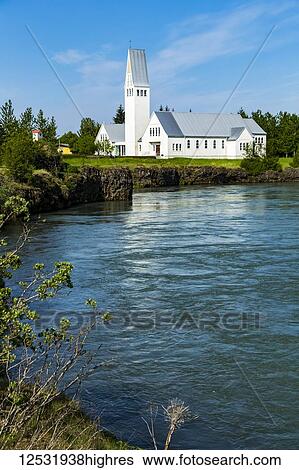 A large church, Selfosskirkja, on the edge of the river; Selfoss, Iceland View Large Photo Image Stock Photograph - A large church, Selfosskirkja, on the edge of the river; Selfoss, Iceland. Fotosearch