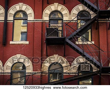 A metal fire escape on a brick building; Winnipeg, Manitoba, Canada View Large Photo Image Stock Photograph - A metal fire escape on a brick building; Winnipeg, Manitoba, Canada. Fotosearch