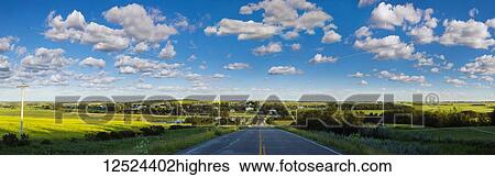 A rural highway surrounded by lush green countryside in the Edmonton area; Alberta, Canada View Large Photo Image Stock Photograph - A rural highway surrounded by lush green countryside in the Edmonton area; Alberta, Canada. Fotosearch