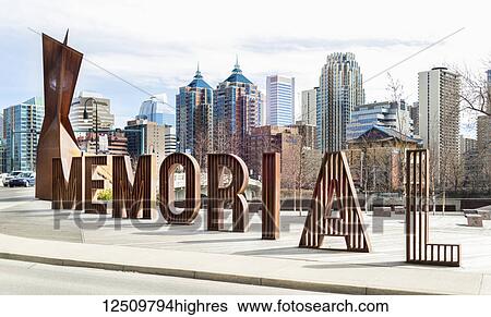 A sign spelled in lettering for Memorial Drive with the Calgary skyline in the background; Calgary, Alberta, Canada View Large Photo Image Stock Photograph - A sign spelled in lettering for Memorial Drive with the Calgary skyline in the background; Calgary, Alberta, Canada. Fotosearch