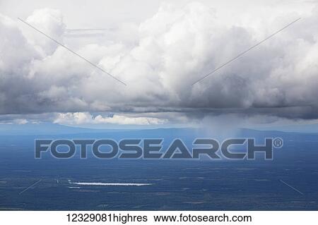 A storm cloud over the blue ocean water with rain falling, Matanuska-Susitna Borough; Alaska, United States of America View Large Photo Image Stock Photograph - A storm cloud over the blue ocean water with rain falling, Matanuska-Susitna Borough; Alaska, United States of America. Fotosearch