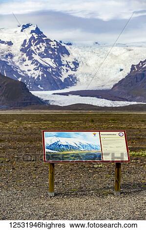 A tourism sign at this Iceland viewpoint describes Hvannadalshnjukur peak on the northwestern rim of the crater of the Oraefajokull volcano in Iceland and is the highest in Iceland; Iceland View Large Photo Image Stock Photograph - A tourism sign at this Iceland viewpoint describes Hvannadalshnjukur peak on the northwestern rim of the crater of the Oraefajokull volcano in Iceland and is the highest in Iceland; Iceland. Fotosearch