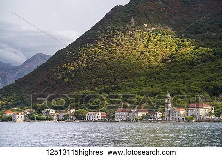 Stock Photograph - A town along the coastline of the Bay of Kotor; Monte. Fotosearch