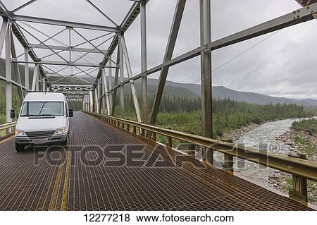 A van driving over the North Tetsa River Bridge, British Columbia, Canada, Summer View Large Photo Image Stock Photo - A van driving over the North Tetsa River Bridge, British Columbia, Canada, Summer. Fotosearch