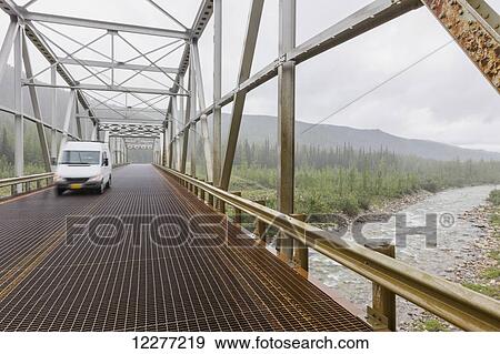 A van driving over the North Tetsa River Bridge, British Columbia, Canada, Summer View Large Photo Image Stock Photo - A van driving over the North Tetsa River Bridge, British Columbia, Canada, Summer. Fotosearch