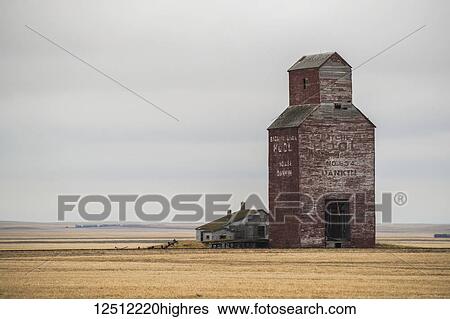 Stock Photograph - Abandoned grain elevator in rural Saskatchewan; Saskatchewan, Canada. Fotosearch