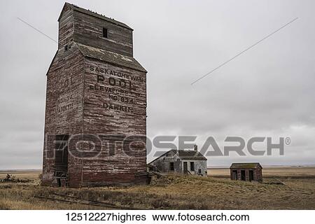Stock Photograph - Abandoned grain elevator in rural Saskatchewan; Saskatchewan, Canada. Fotosearch