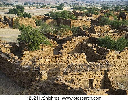Stock Photograph - Abandoned village in the Jaisalmer district of Rajasthan. Kuldhara acquired reputation as a haunted site; Jiyai, Rajasthan, India. Fotosearch
