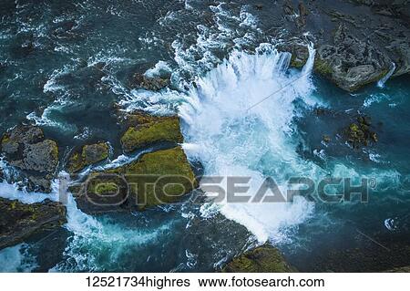 Stock Photograph - Aerial view of Godafoss, also known as 'Waterfalls of the gods'; Iceland. Fotosearch
