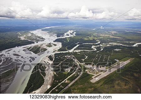 Stock Photograph - Aerial view of the Talkeetna River and landscape; Alaska, United States of America. Fotosearch